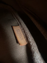 Louis Vuitton Pochette Accesoires - modelo original