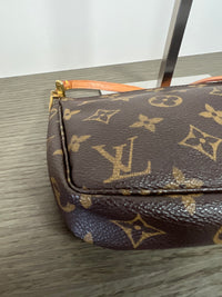 Louis Vuitton Pochette Accesoires - modelo original